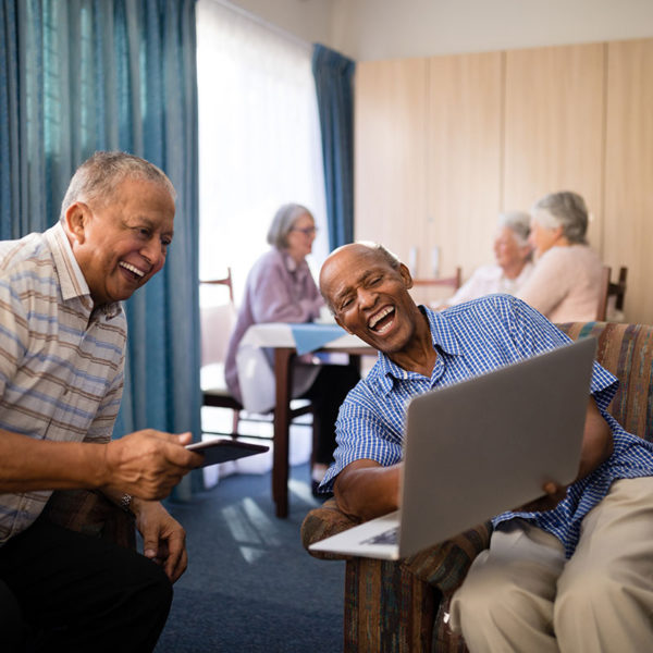 Two elderly men in senior care