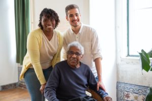 Two Caregivers with Patient